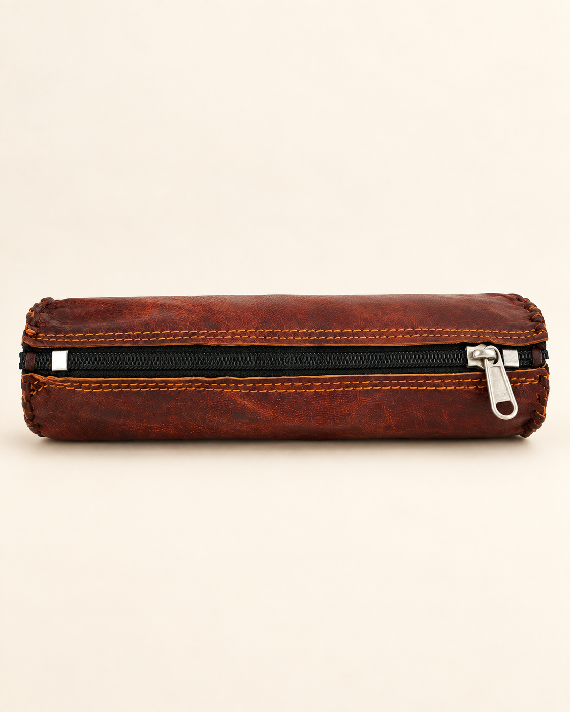 Natural brown full-grain leather pencil case with zip closure